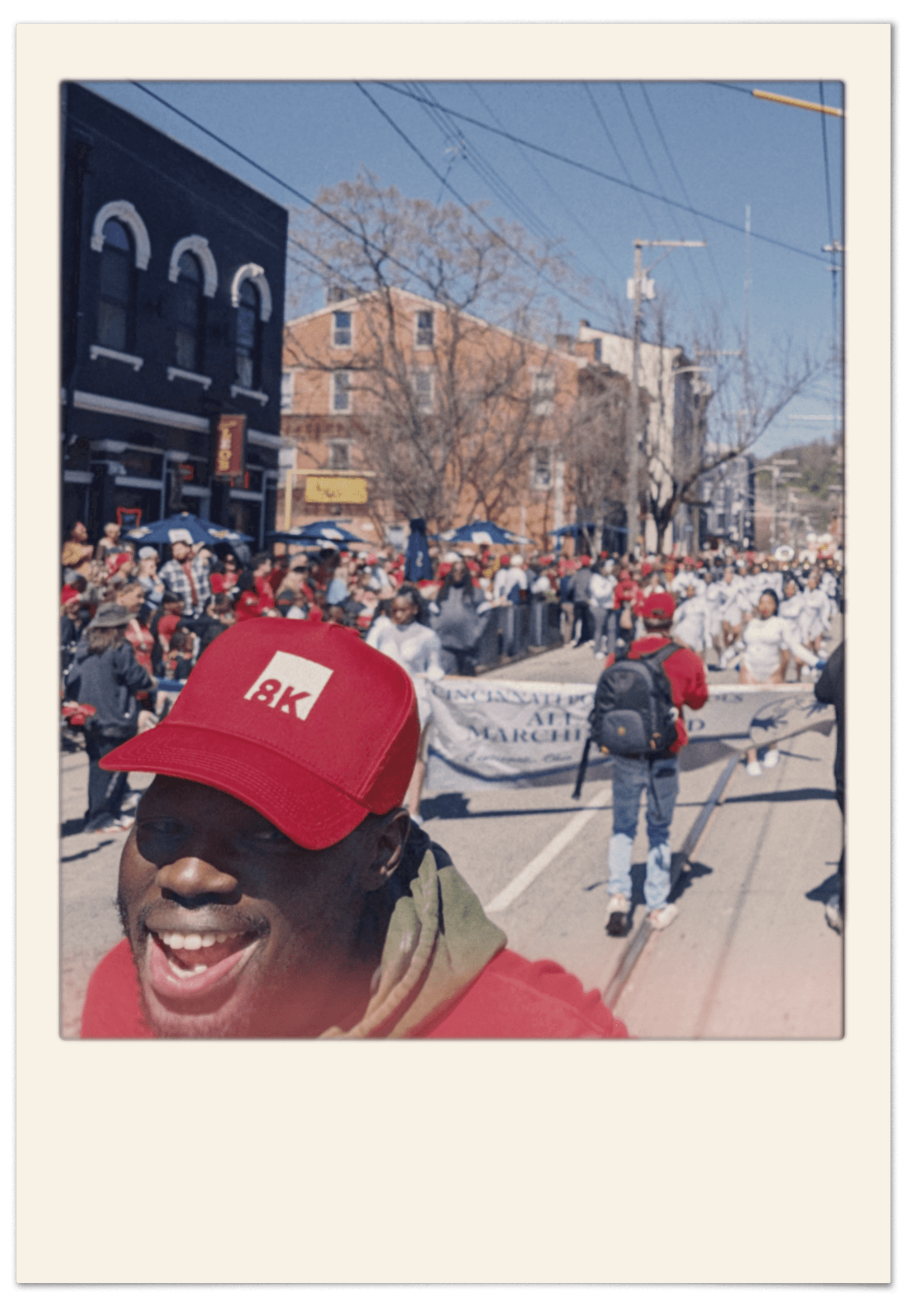 8K team member at a Cincinnati neighborhood parade