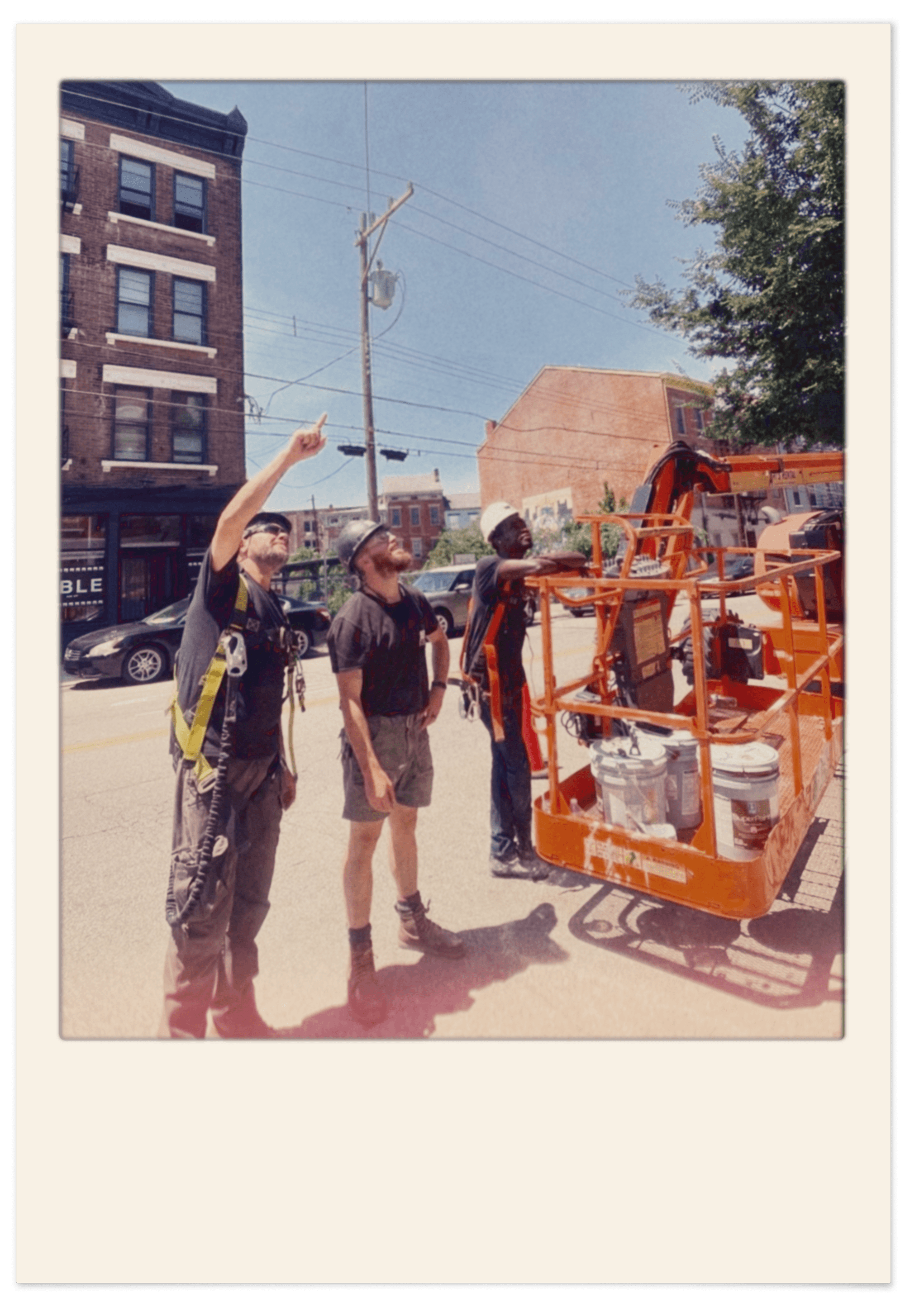 8K construction crew working on a neighborhood building